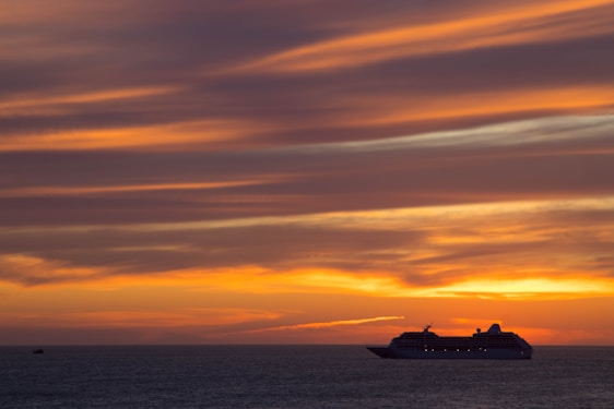 A vibrant scene of happy travelers aboard a cruise ship, capturing the excitement of setting sail.