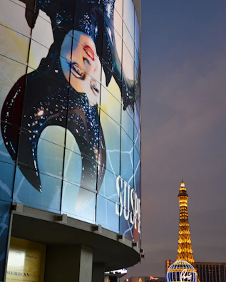 womans face on glass building