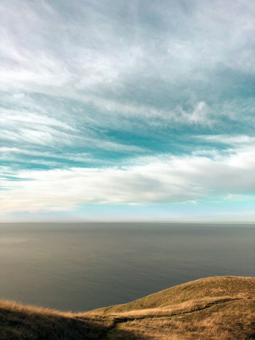 blue sky and white clouds over the sea