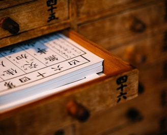 brown wooden framed white and black calendar