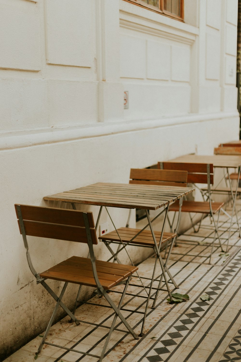 brown wooden table and chairs