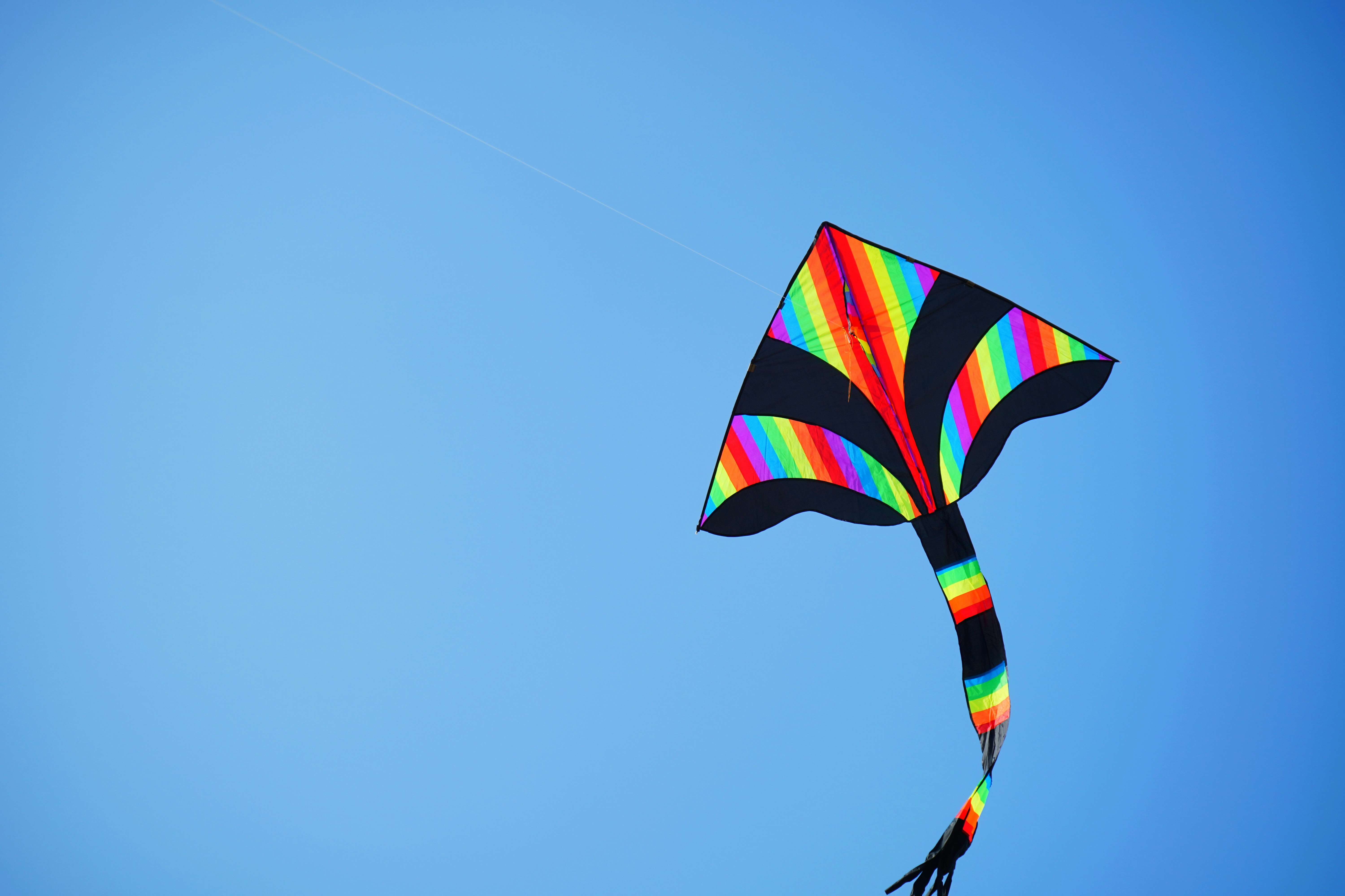 blue yellow and red striped umbrella