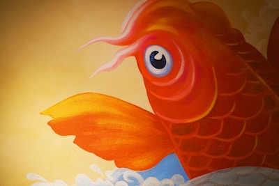 A vibrant illustration of a fish swimming through colorful waves representing creative branding.