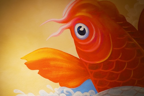 A vibrant fishing calendar page with fish icons and dates highlighted