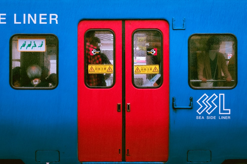 blue and red train door