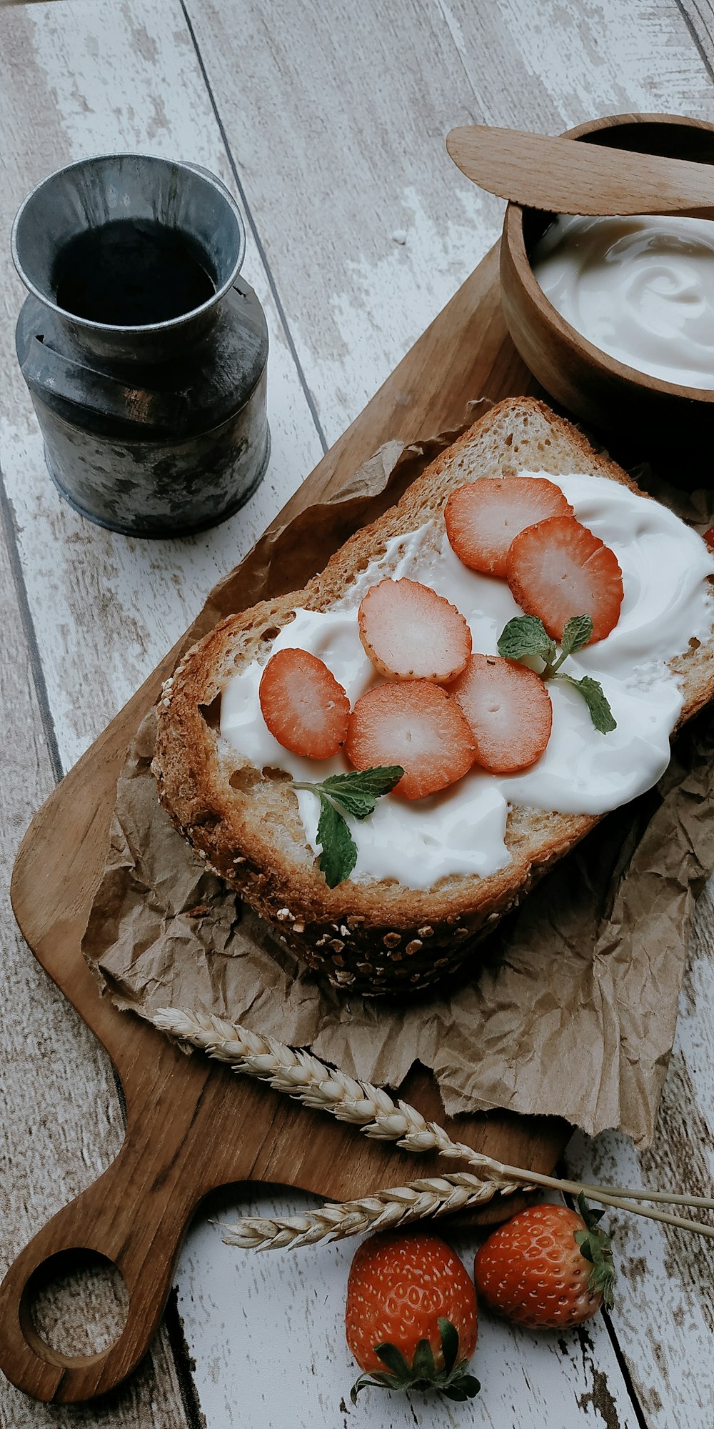 strawberry cake on brown wooden tray