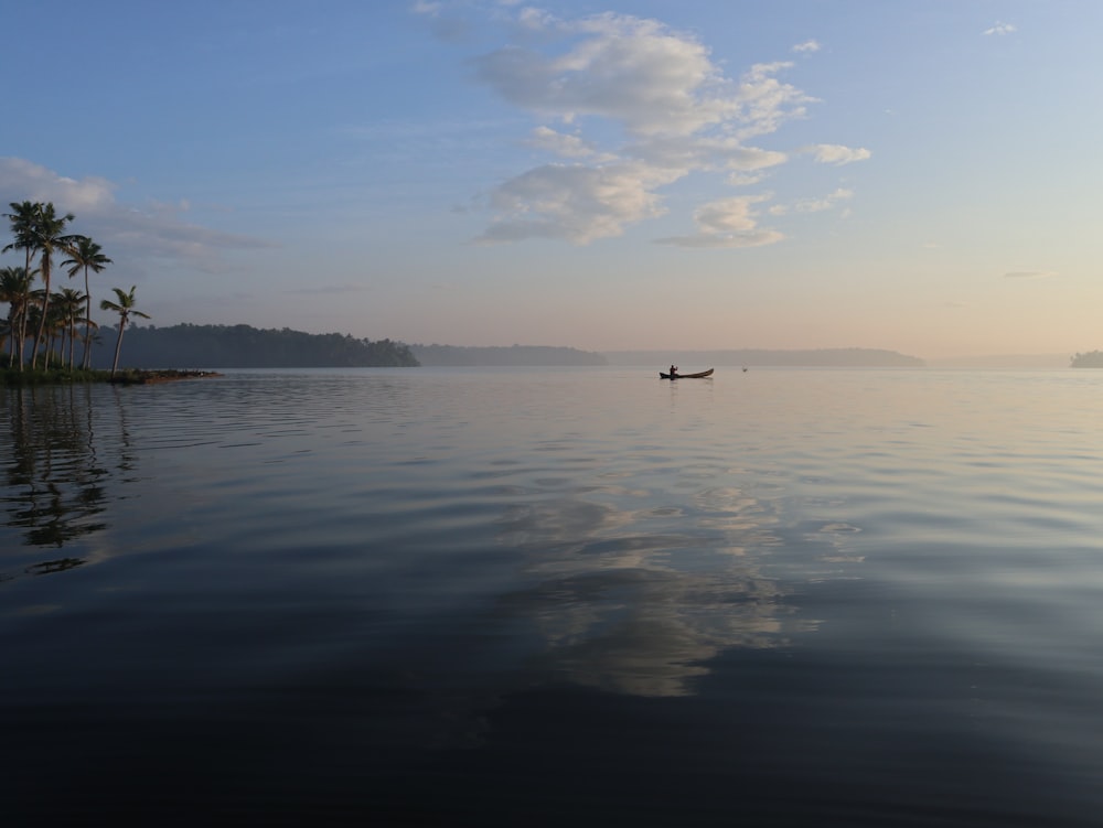 person in body of water during daytime