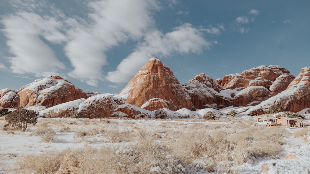 brown rocky mountain under blue sky during daytime