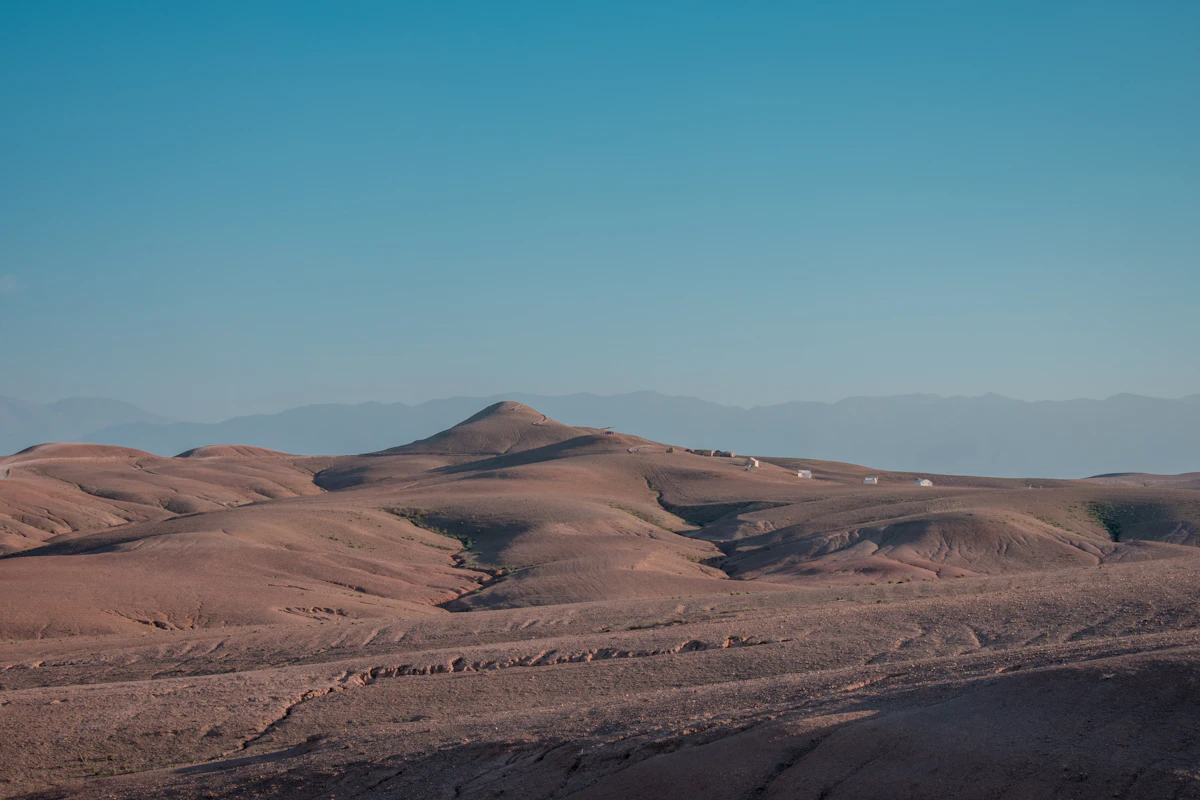 Brown stony desert under a blue sky, Agafay, Morocco