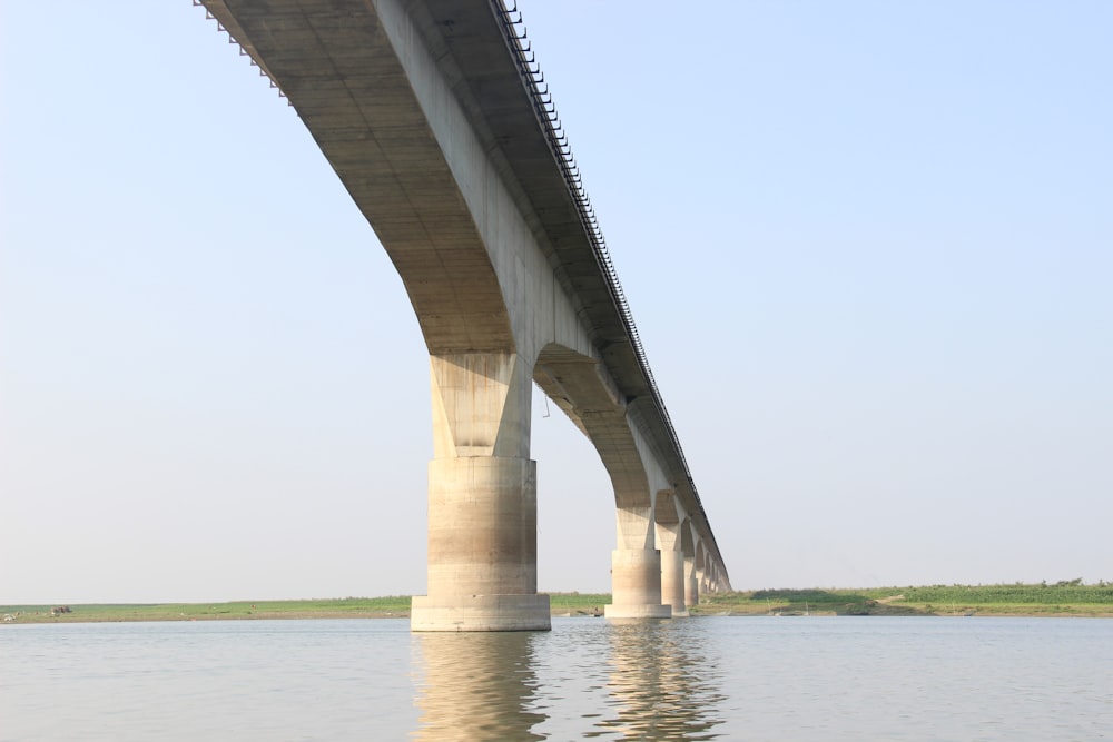 brown concrete bridge over the water