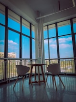 Stylish seating area in the city view room with natural light.