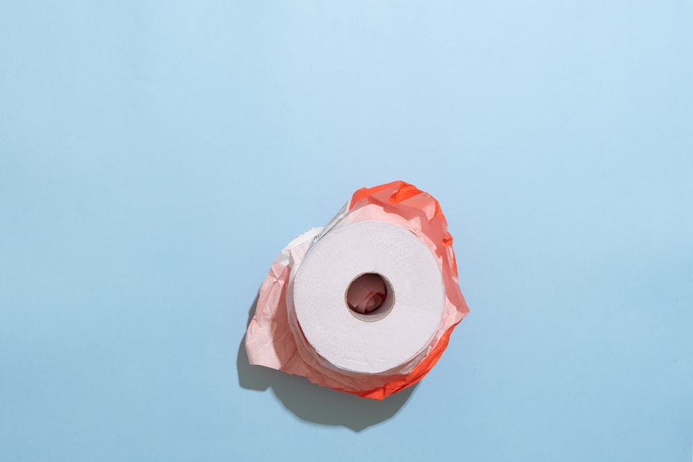 white tissue roll on white table