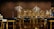 A luxurious and sophisticated interior space featuring elegant dining tables and chairs with black upholstery and wooden accents. The walls have a reflective, geometric design with intricate, illuminated floral decorations. The floor showcases a polished, patterned surface, contributing to the high-end atmosphere.