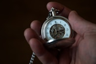 silver and white chronograph watch