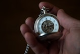 silver and white chronograph watch
