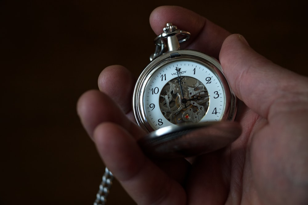 silver and white chronograph watch