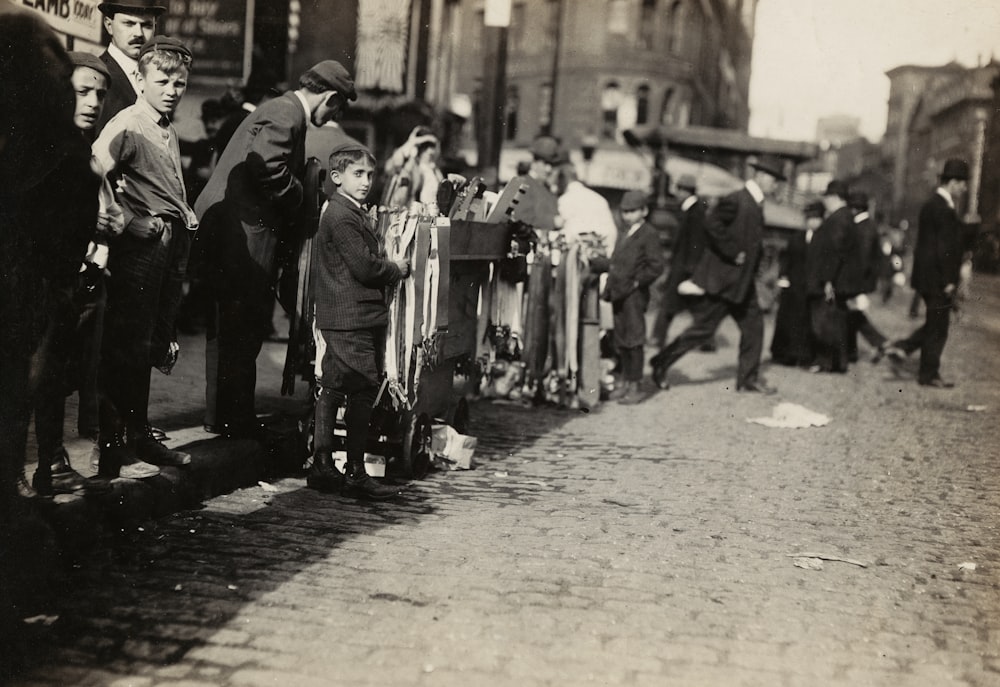 grayscale photo of people walking on street