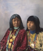 2 women in red and blue dress