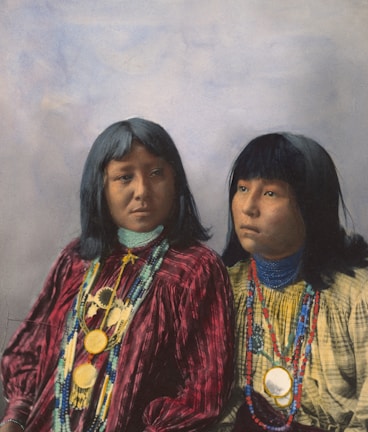 2 women in red and blue dress