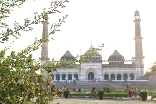 white concrete building during daytime in Bara Imambara India