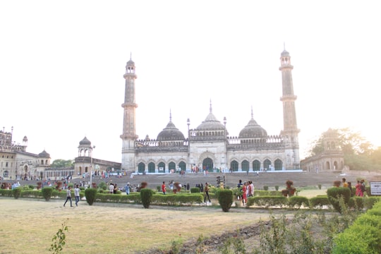 white concrete building during daytime in Bara Imambara India