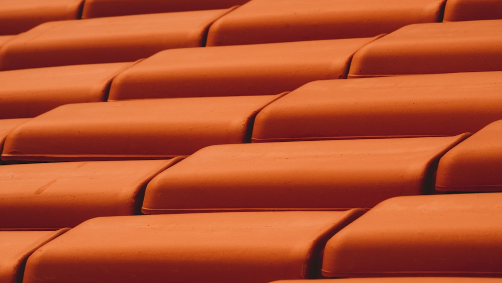 orange plastic chairs with white ceramic plate