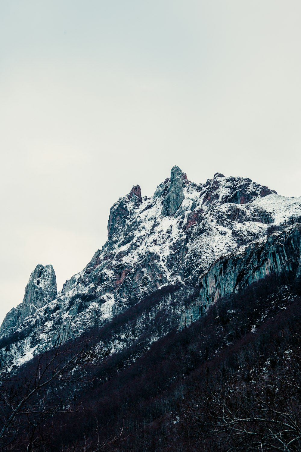 snow covered mountain during daytime