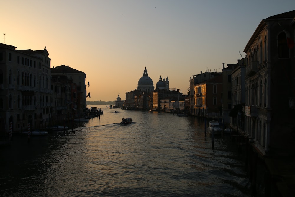 body of water near buildings during daytime