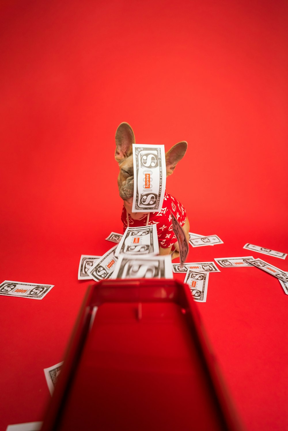 white and red robot on red table