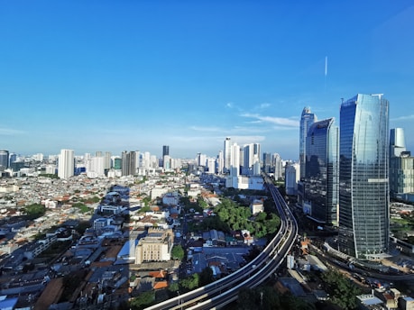 city buildings under blue sky during daytime