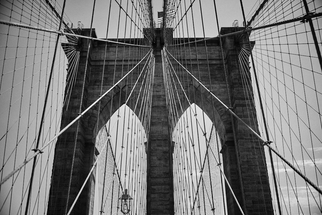 grayscale photo of brooklyn bridge