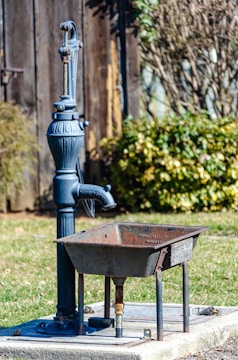 black and gray metal fire pit