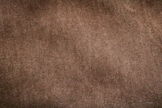 Close-up of smooth, eco-friendly fabric texture on a Velmora home goods product