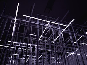 white metal frame in grayscale photography
