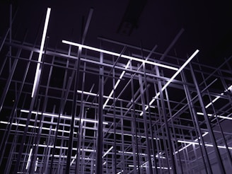 white metal frame in grayscale photography