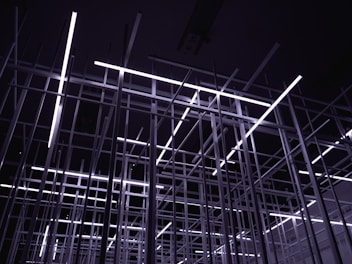 white metal frame in grayscale photography