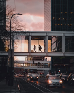 cars parked in front of building during daytime