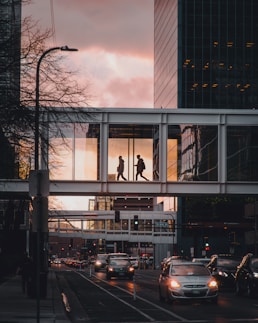 cars parked in front of building during daytime