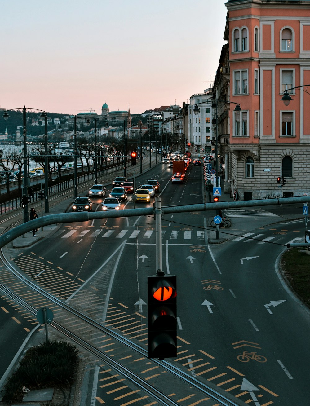 cars on road near buildings during daytime