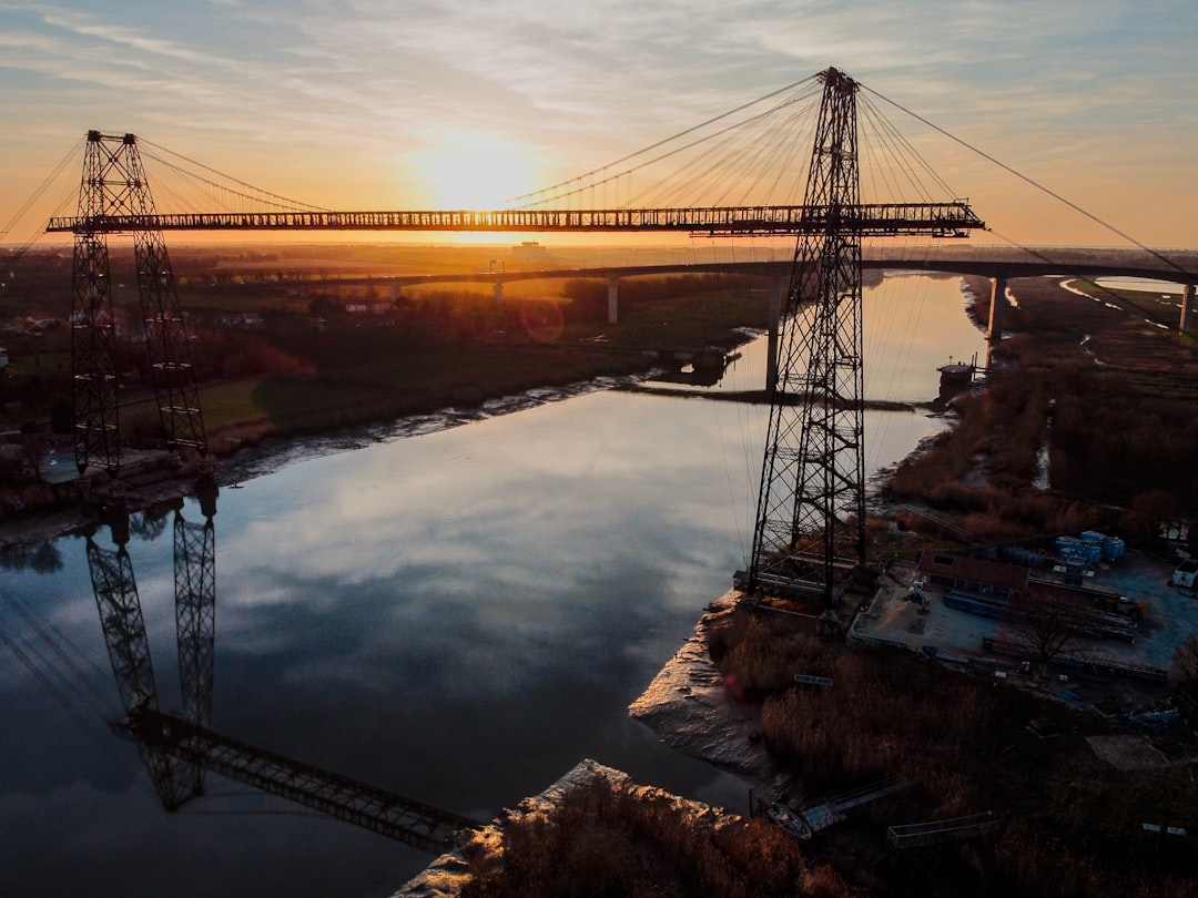 bridge over river during daytime