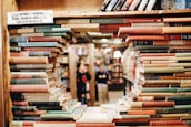 books on brown wooden shelf