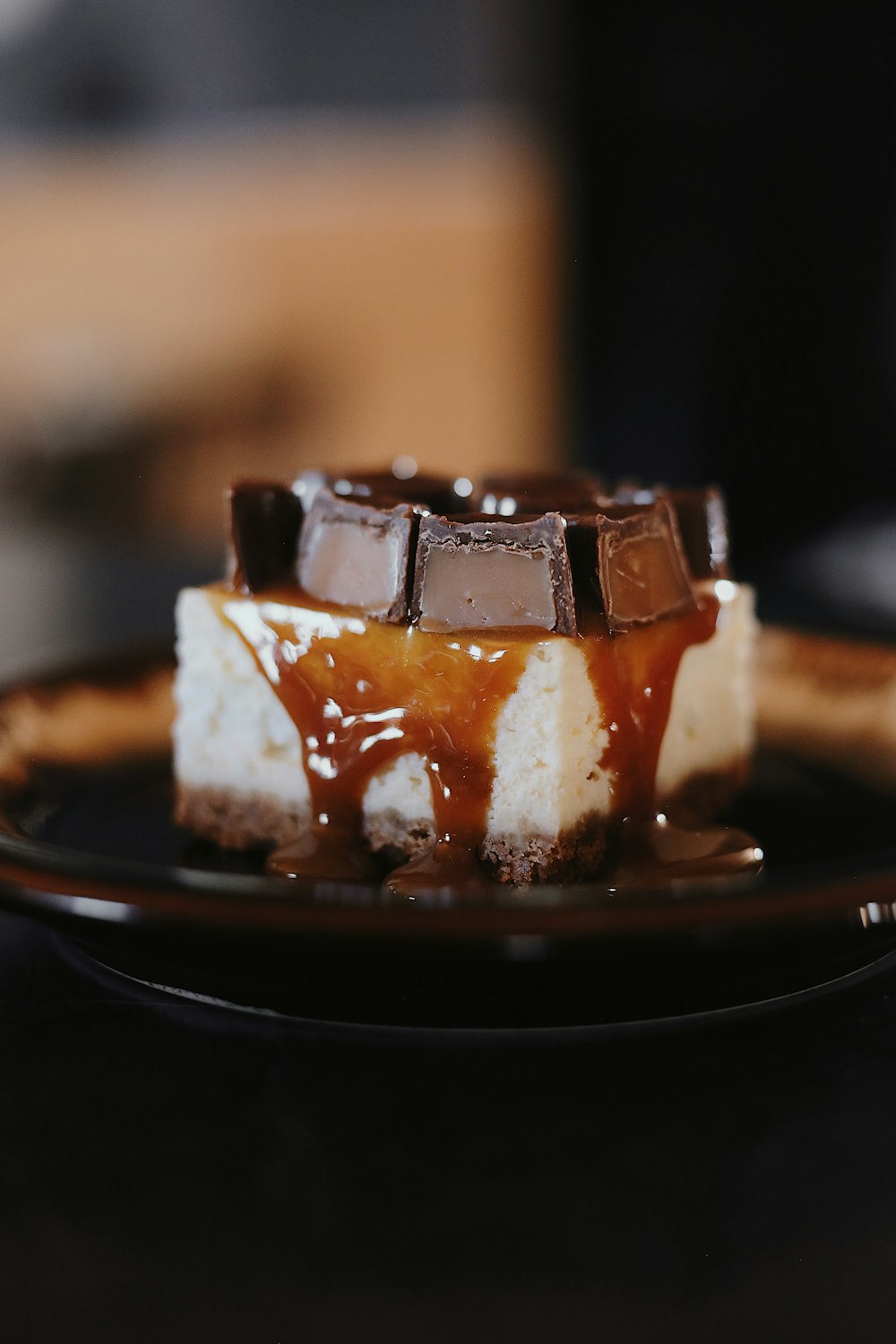 chocolate cake on black ceramic plate