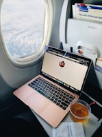 a laptop computer sitting on top of a table