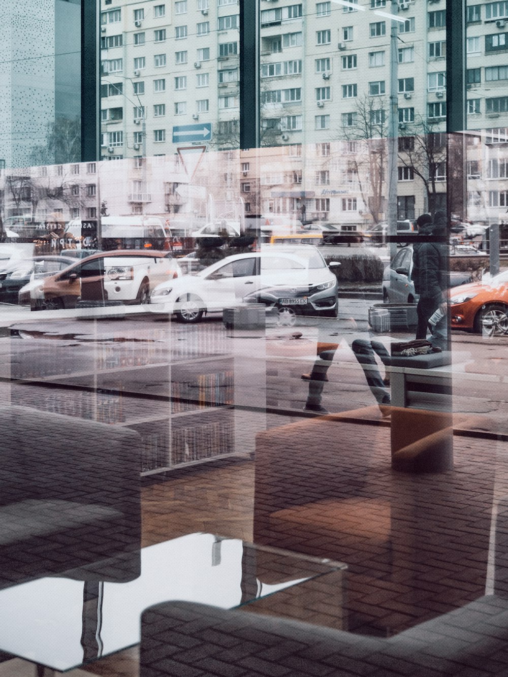 cars parked in front of building during daytime