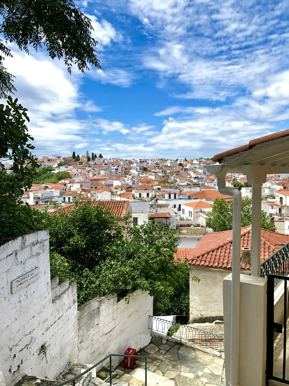 white and brown concrete houses under blue sky during daytime