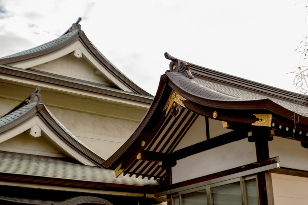 the roof of a building with a bird perched on top of it