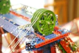 green and red plastic toy