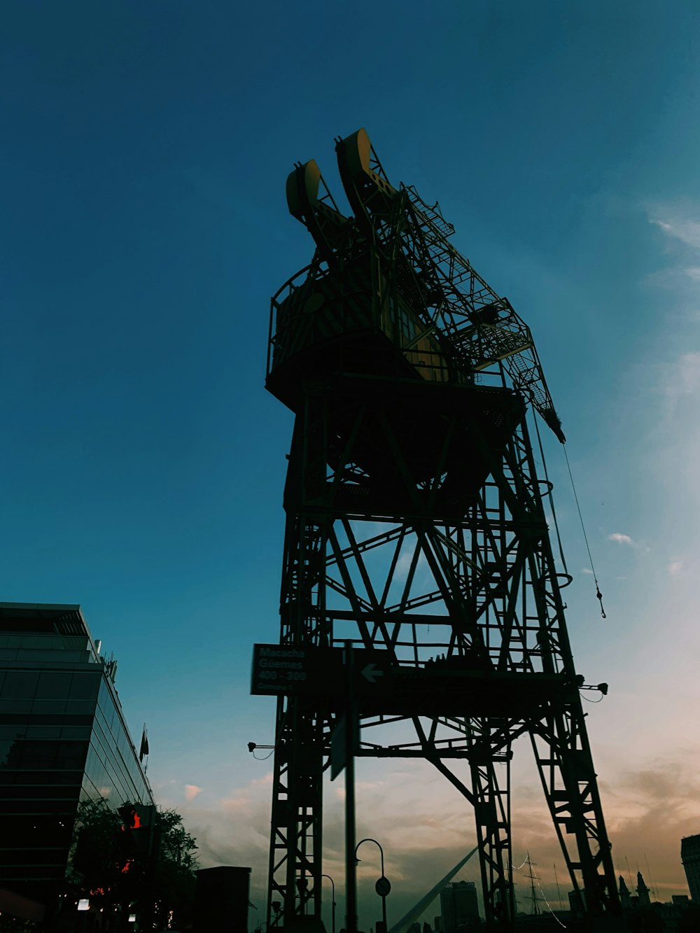 black metal tower under blue sky