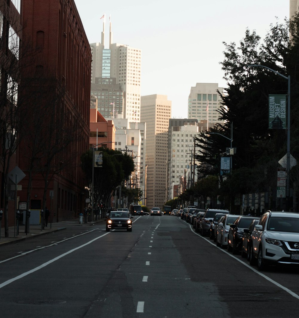 cars parked on side of the road during daytime