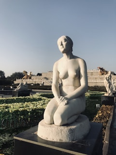 An elegant sculpture displayed in a serene setting.